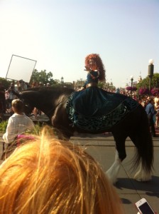 Merida riding in on Angus for her official coronation at Walt Disney World on Saturday May 11